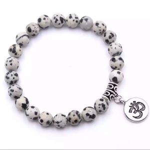 Dalmatian Jasper Bracelet with Ohm charm